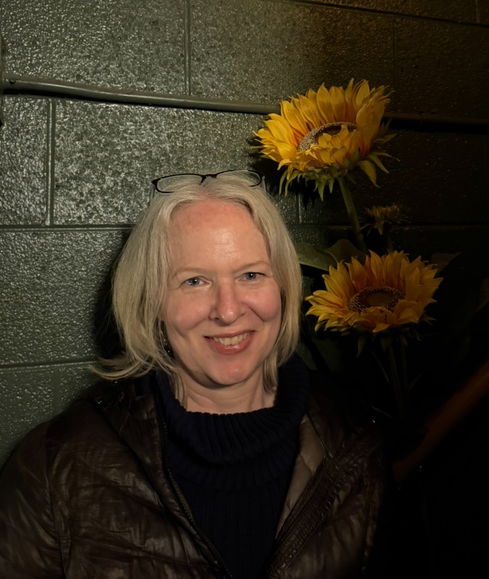 TessPowersheadshot2025